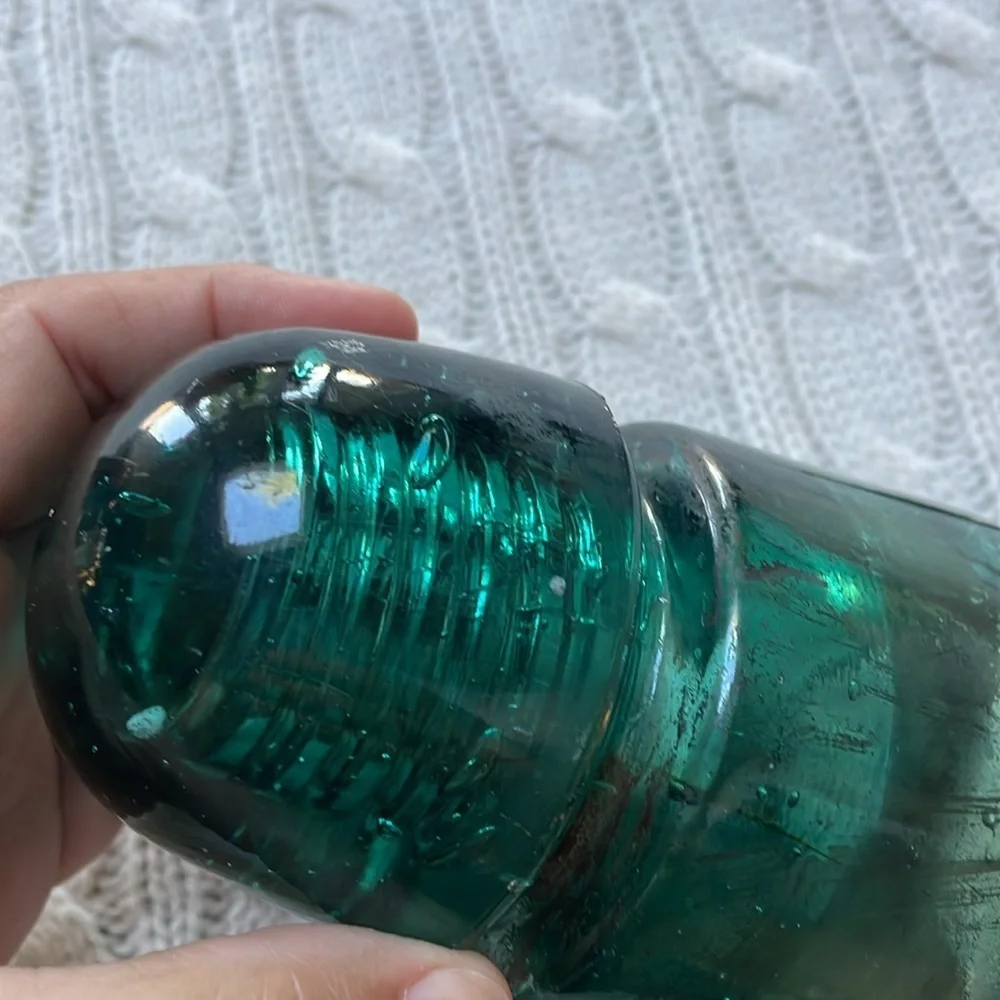 Antique glass insulator. Aqua teal glass. Threads inside stamped B on outside